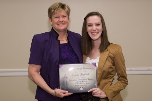 Dr. Carol Cox presented Alyssa with her award.