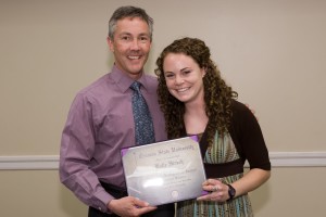 Dr. Michael Bird presented Katie with her award.
