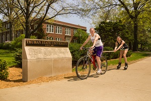 The markers by the Campus Gates, which commemorate the University's rich history, list the former names of Truman State University.