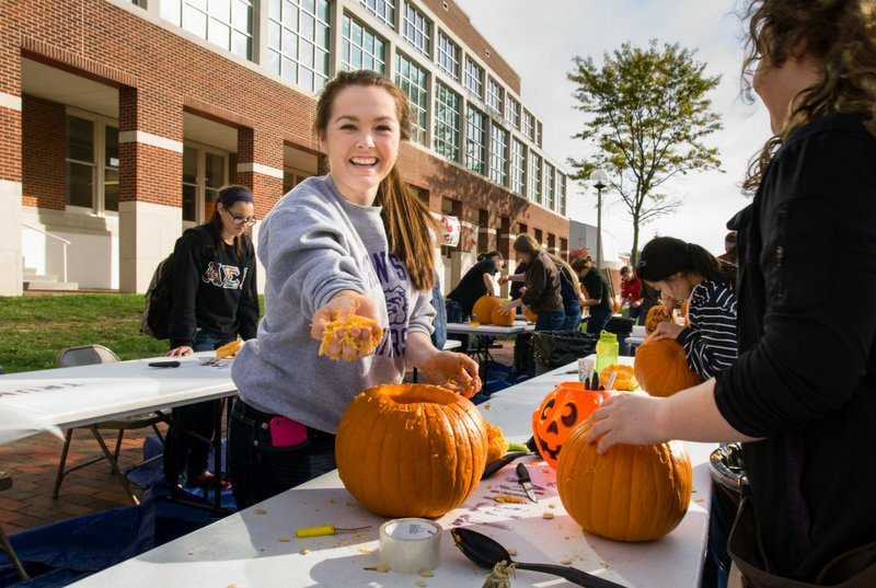 Pumpkin carving on the campus mall