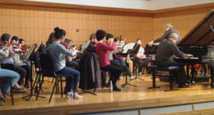 University Orchestra collaborating with members of the Boccherini and Puccini Conservatories