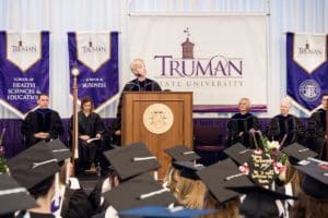 President Thomas addressing graduates at Commencement