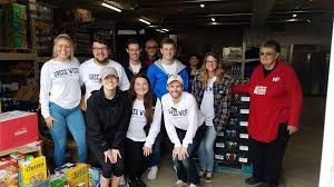 Group of volunteers helping out at Food Bank