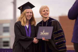 Truman student presented with diploma by President Sue Thomas