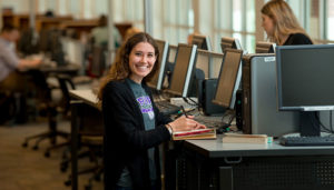Student using a computer in Pickler Memorial Library
