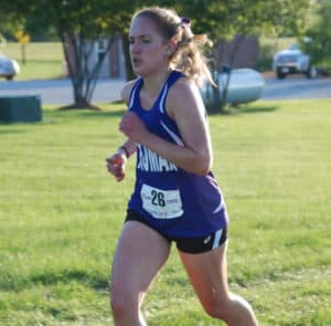 Erica running at a track meet