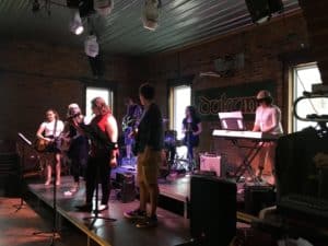 Musicians performing on a stage