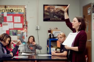 Teacher with students in classroom