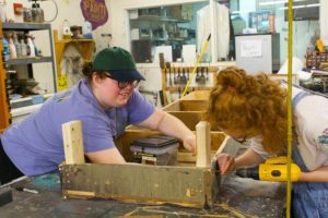 Students working on a set design